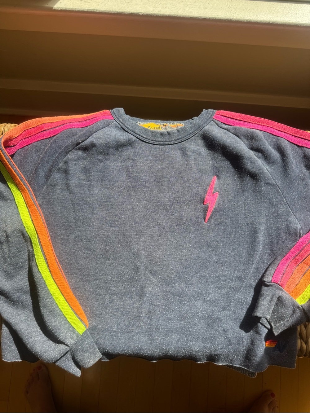 Aviator Nation Women's Dark blue Lightning Bolt Sweatshirt with Neon Stripes.